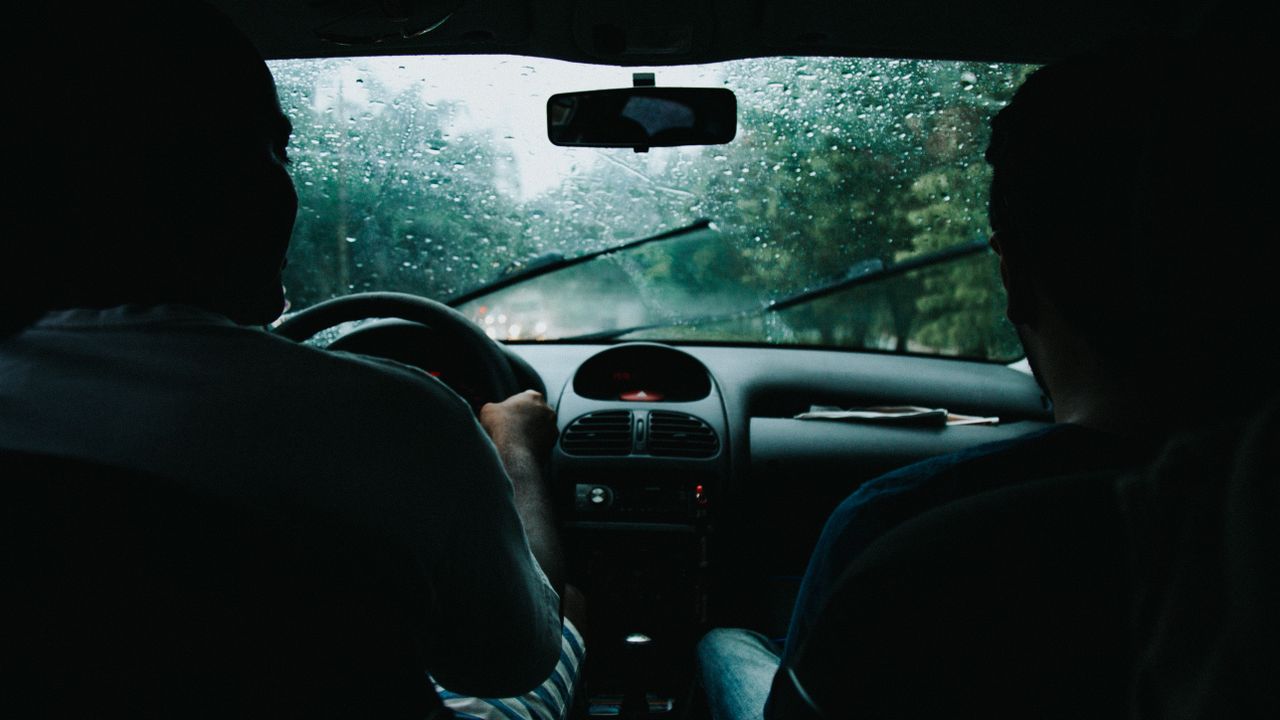 Close-up of damaged windscreen with spreading crack